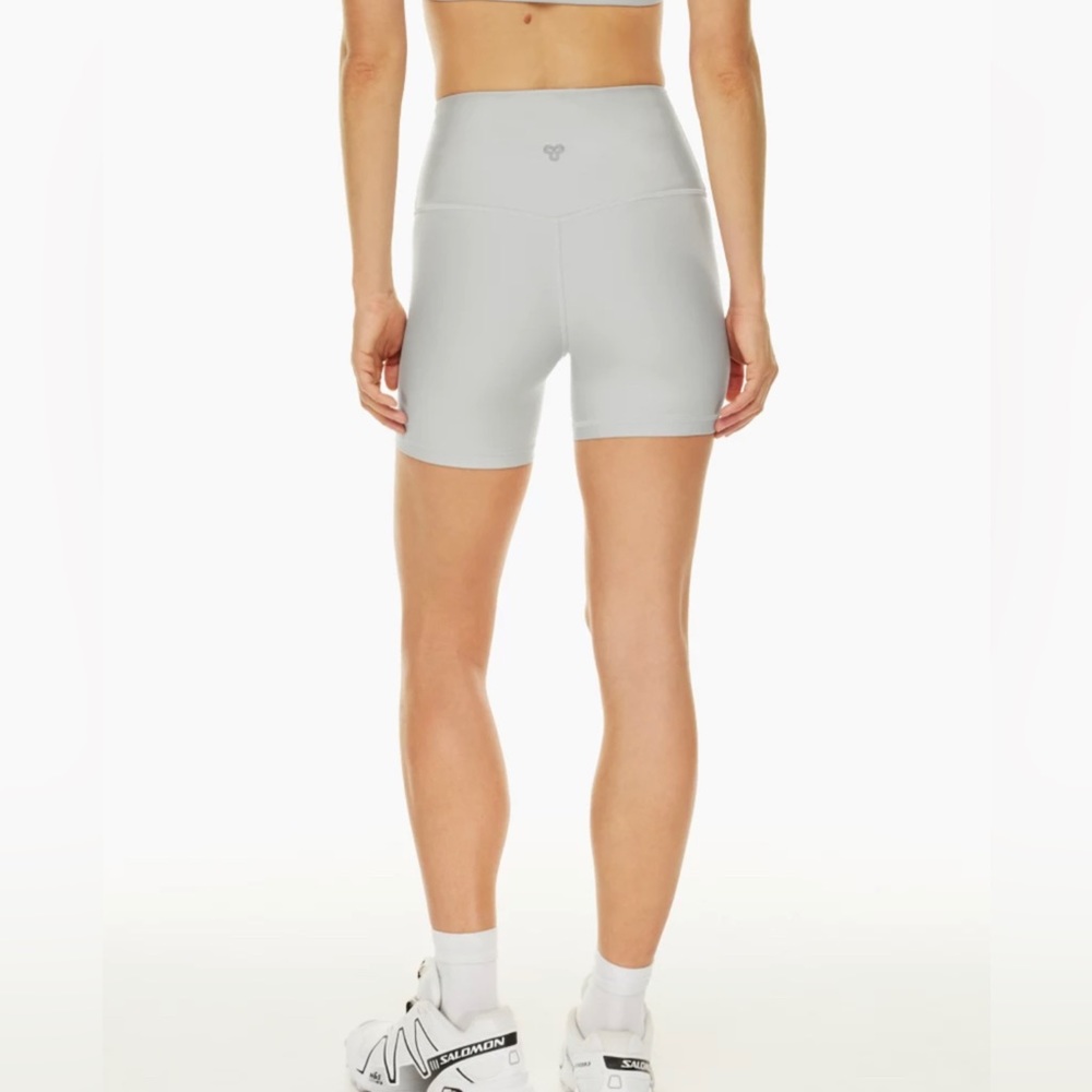Aritzia TNA Gloss Biker Short in gray.